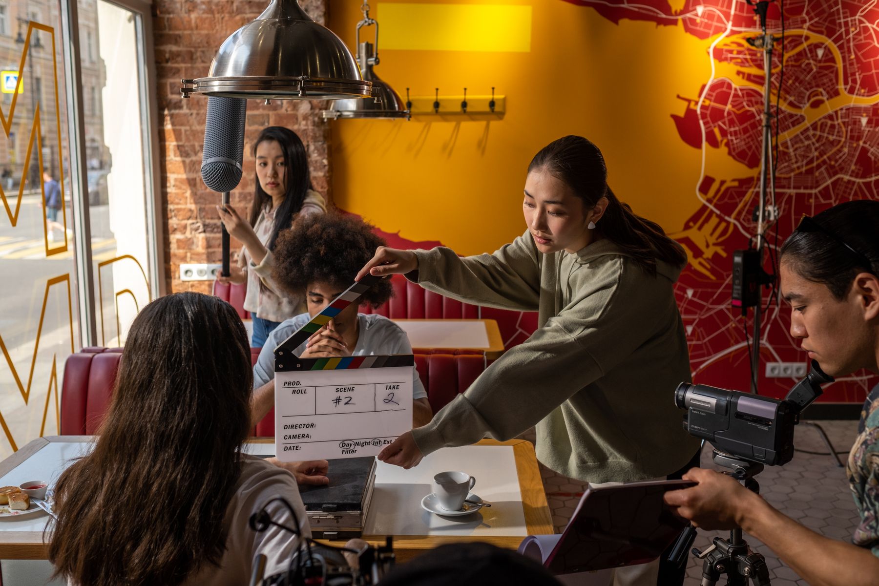 Production team reviewing plans in a collaborative workspace