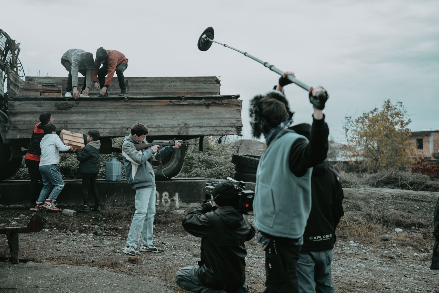 Film crew working together at an exterior location