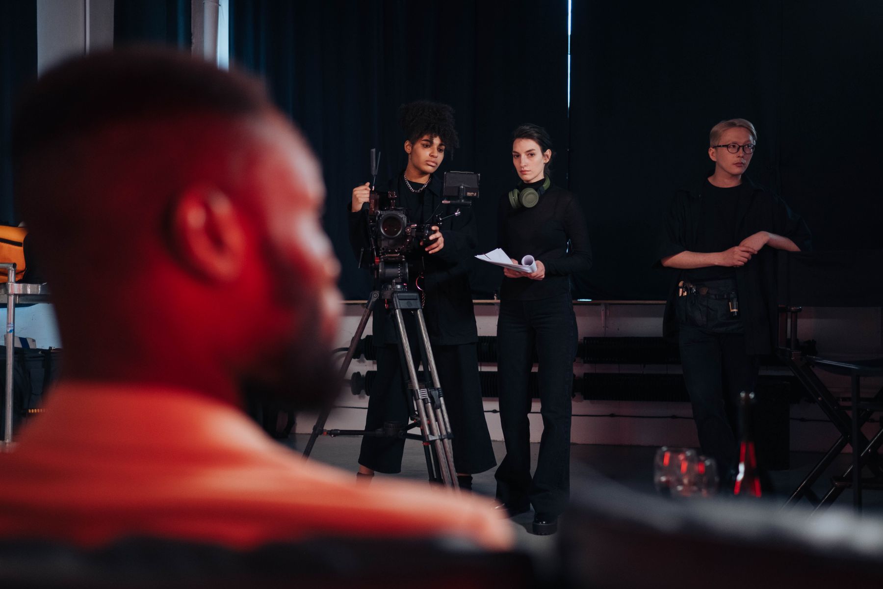 Crew working in a production studio environment
