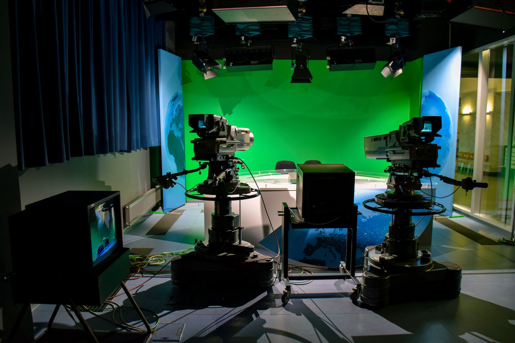 Broadcast studio with cameras and control equipment